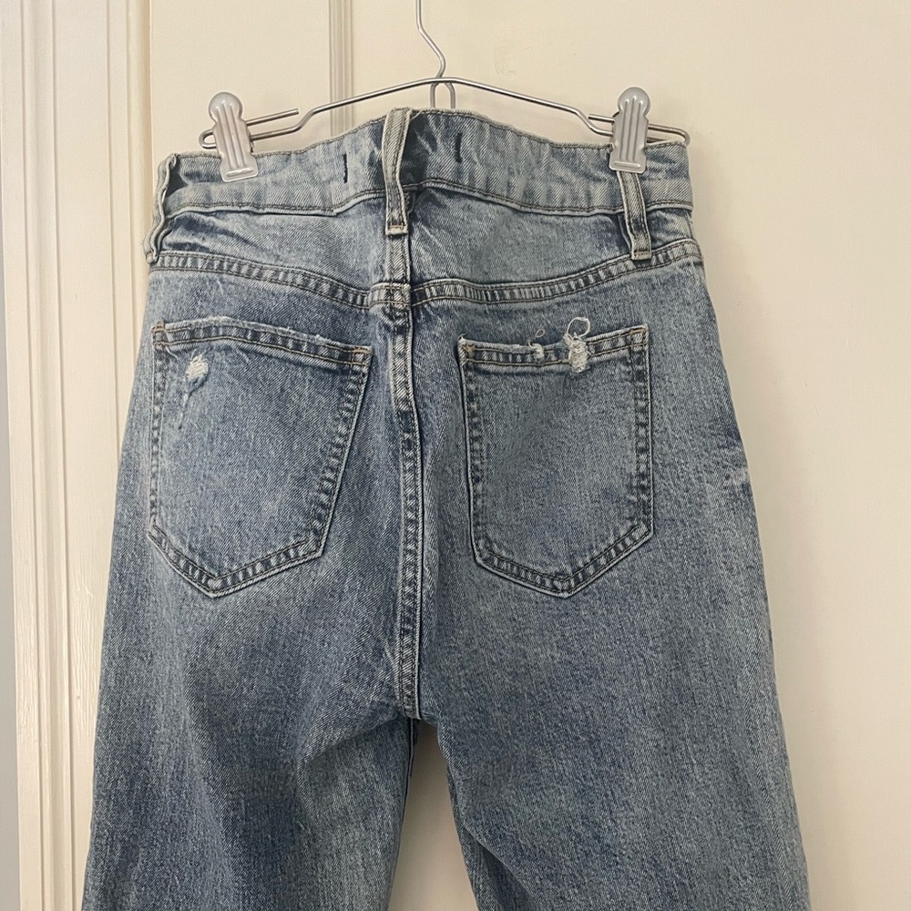 Jeans with hole in knee
